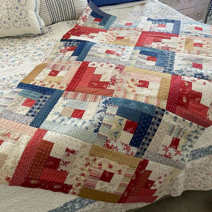 classic patchwork techniques and the "log cabin" pattern.